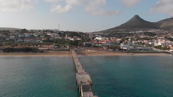 Flying into the town of Porto Santo over the boardwalk.