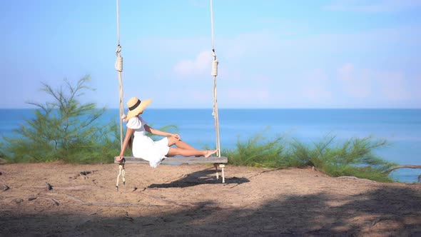 Asian woman enjoy around beautiful beach sea ocean