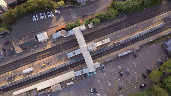 Trains Stopping at a Station in the UK Aerial View