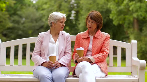 Senior Women or Friends Drinking Coffee at Park