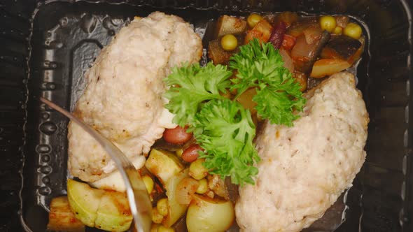 POV Video an Unrecognizable Person Eats a Cutlet From Plate with Fork