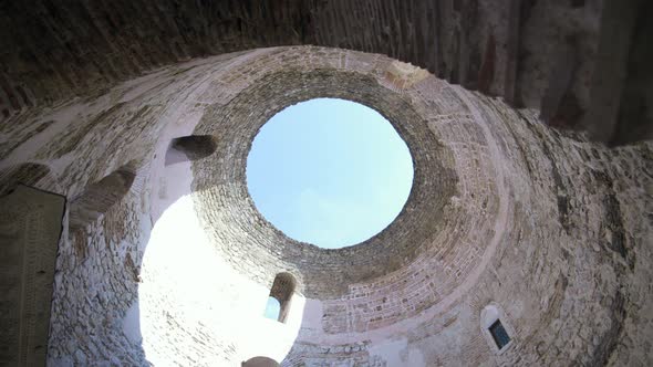 Pan from below of hole in dome ceiling at Diocletian’s Palace in Split