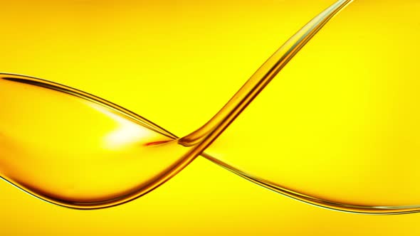 Super Slow Motion Shot of Swirling and Splashing Golden Oil at 1000Fps.
