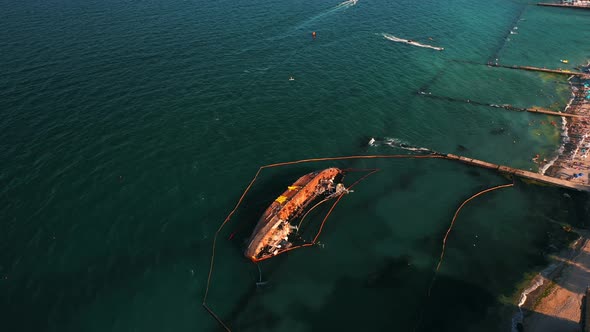 Top View of an Old Tanker That Ran Aground and Overturned