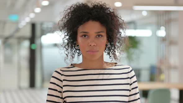 African Woman Looking at Camera