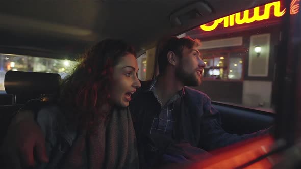 Couple sightseeing from inside of car