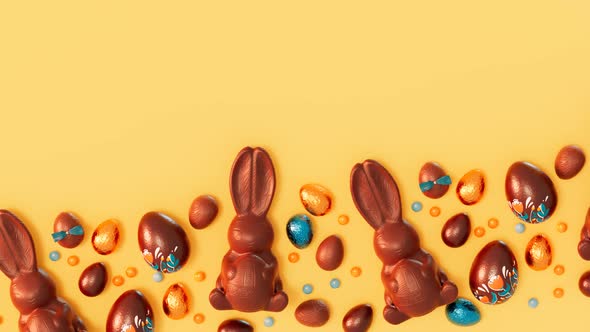 Set of adorable chocolate Easter bunnies and eggs. Cute sweets. Happy Easter.