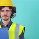 Young Arhitect with Safety Glasses and Helmet That is Looking at Camera - VideoHive Item for Sale