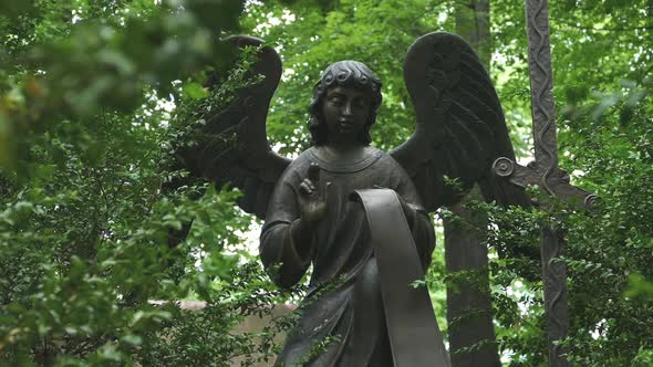 Orthodox Cemetery - Bronze Angel and Park Trees - 02 alt