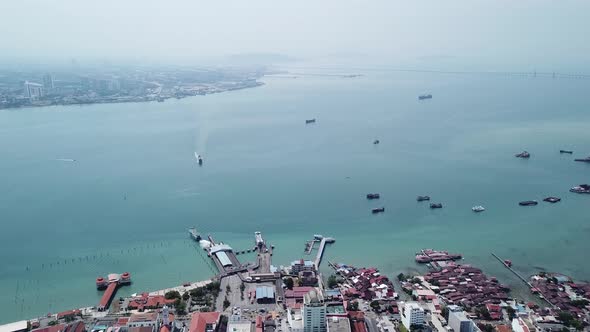 Ferry move toward Penang Ferry Terminal.