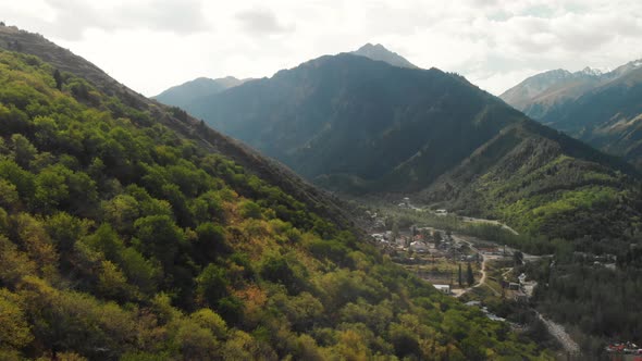 Aerial Drone Shot of Green Forest and Mountains in Kazakhstan