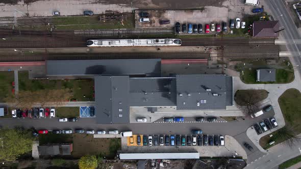 Aerial View of Railway Station with Arriving Train