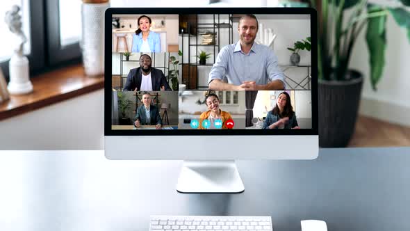 Online Business Meeting of Multiracial Business Partners Communicating Remotely