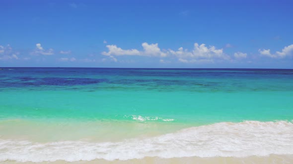 Beach Sand Sea Shore with Blue Water