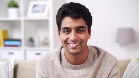 Portrait of Happy Smiling Young Indian Man at Home