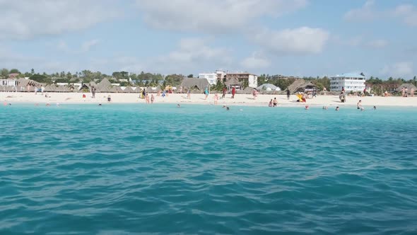 Zanzibar Coastline with Sandy Beach Palms and Hotels