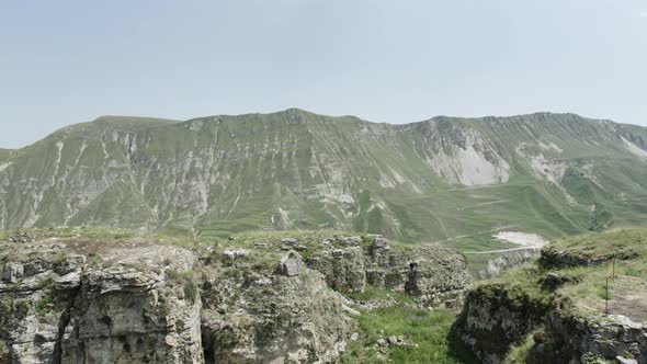 Flying above green slopes