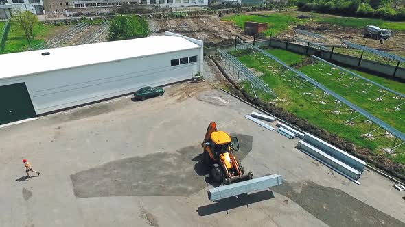 Tractor working on the yard