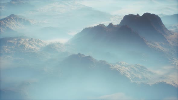 Distant Mountain Range and Thin Layer of Fog on the Valleys