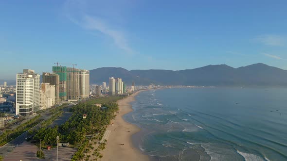 Aerial Slowmotion Shot of the Coastal Part of the City of Danang in Central Vietnam