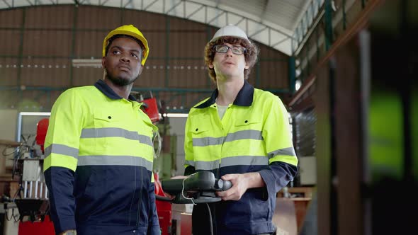 Diversity team of factory engineers ,leadership by engineer women are inspecting and consulting work