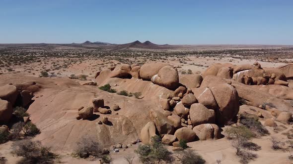 Panoramic footage of a beautiful desert and lots of huge round rocks