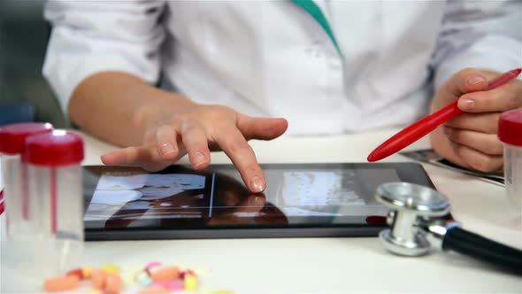 Doctor Examines An X-ray Images