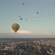 Hot air balloons fly over the summer city. - VideoHive Item for Sale
