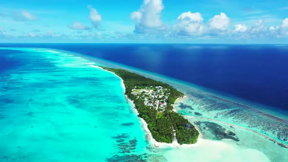 Aerial drone sky of relaxing coast beach break by aqua blue sea with white sandy background of a pic