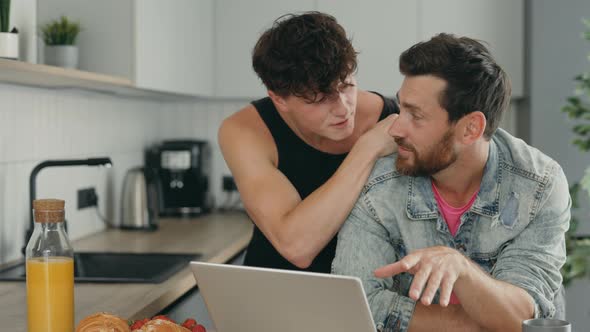 Lgbt Gays Feeling Happy Couple Using the Laptop for Video Call to Tell Good News to Their Relatives