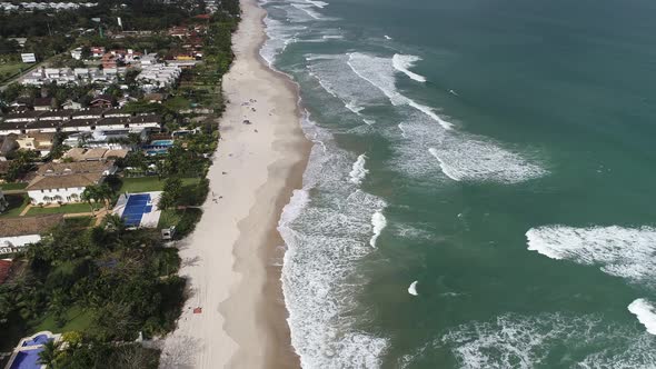 Brazilian Maresias beach landmark. Tropical summer beach.