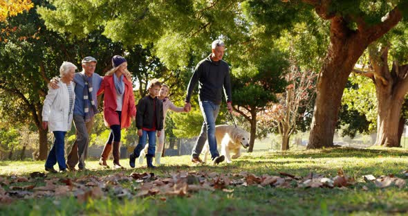 family with dog outdoors