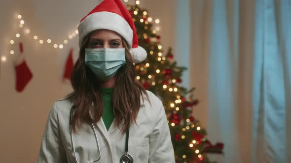 Female doctor smiles at Christmas