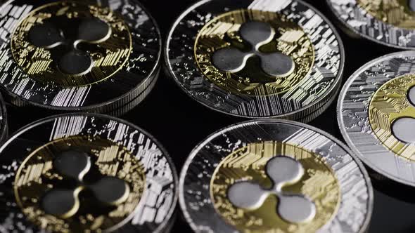 Rotating shot of Bitcoins (digital cryptocurrency) - BITCOIN RIPPLE 