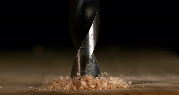 Wood Chip Turning on a Wood Board, Making Chips, Slow Motion 4K