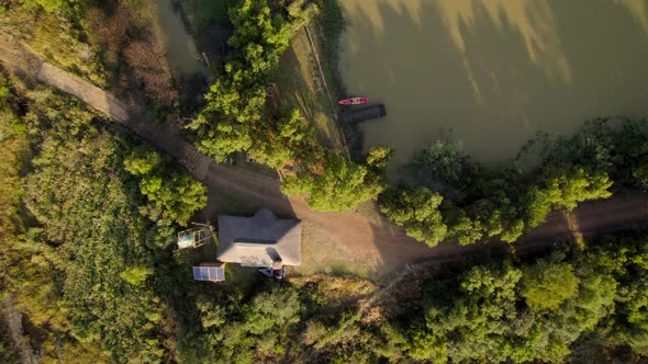 eco efficient ranch with solar panels, sustainable lakeside cottage. Bird eye view