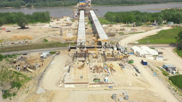 Aerial view of the construction of the bridge and the highway passing