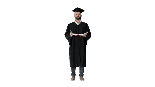 Male student graduate showing diploma on white background.