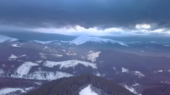 Flying Over the Mountains in Winter