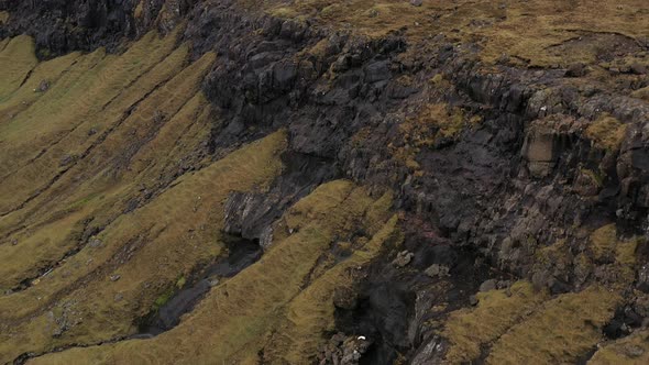 Drone Flight Over Rock Mountain Slopes Of Faroe Islands