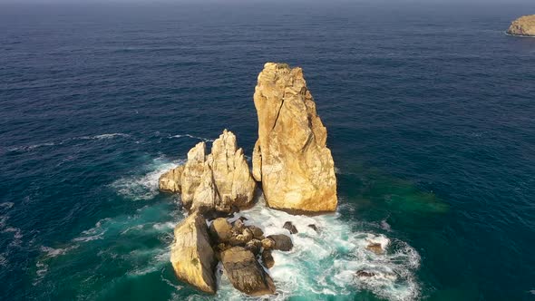 Thousands of Birds Fly Over a Small Island Aerial View