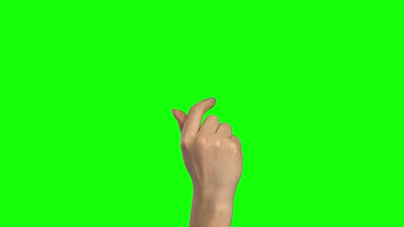 Arm of Female Scrolling a Screen. Green Screen. Close Up