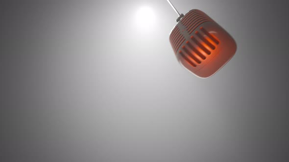 Animation with metal vintage microphone above the boxing ring. Fog and spotlight