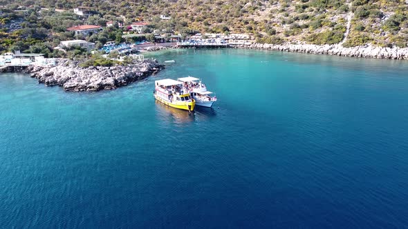 Drone shot of the boats at the sea.