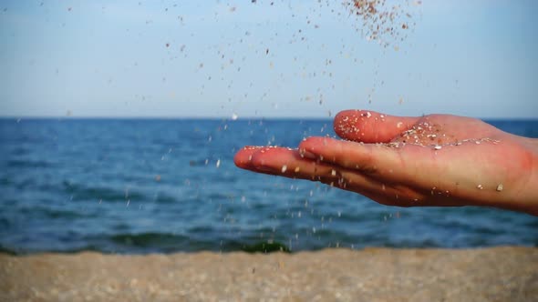 A man throw sand