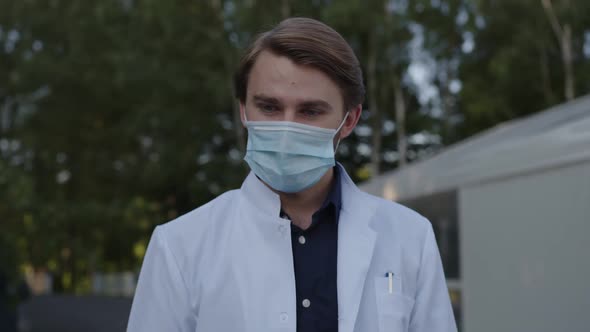Close Up Young Doctor in Blue Medical Mask