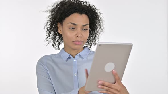 Portrait of Serious Young African Woman Using Tablet