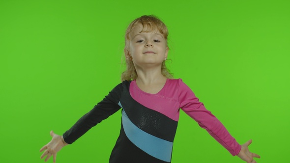 Child Ballerina Exercising in Studio on Chroma Key Background. Girl Kid Dancing, Making Gymnastics