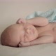 Sleeping Newborn Baby in Plaid - VideoHive Item for Sale
