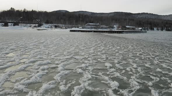 Lake surface frozen Winter Aerial 4K